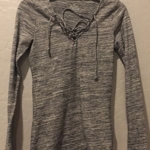 A gray long sleeve tied v-neck